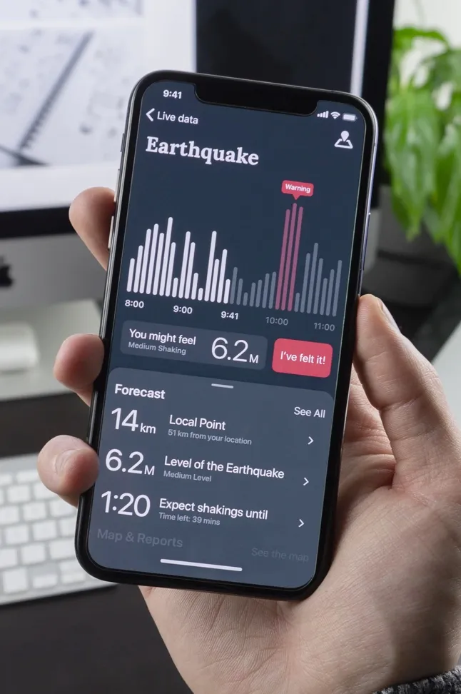 Person using a smartphone with financial app open